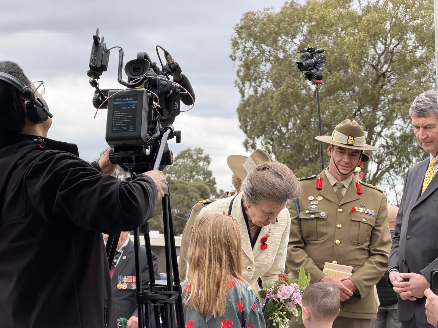 Webcasting Livestream camera operator filming HRH Princess Anne at Simpson Barracks, Melbourne