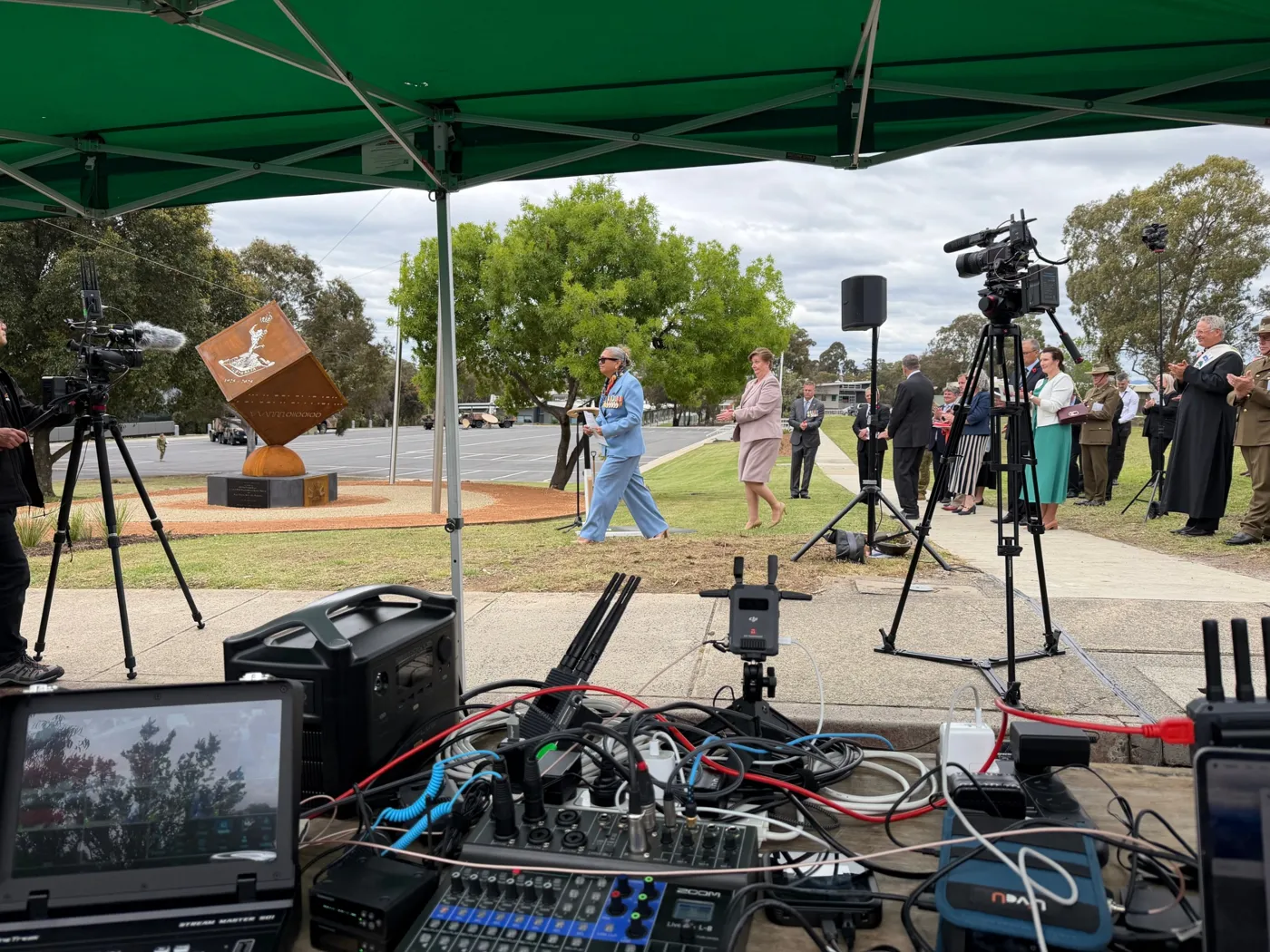 Outdoor live broadcast control position at Simpson Barracks with bonded encoder, audio mixer, battery power and camera positions