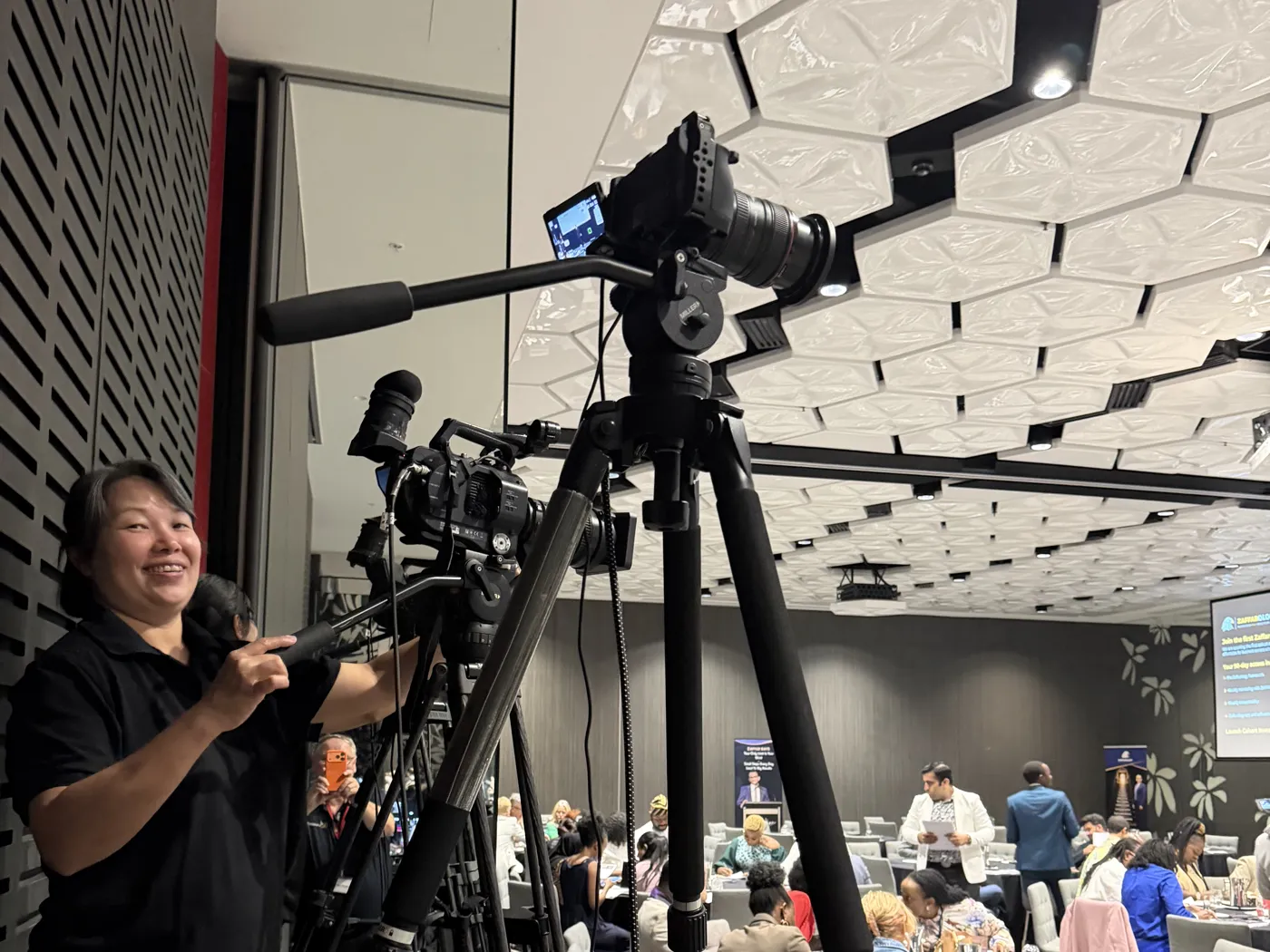 Webcasting Livestream camera operator recording the Zaffarology Transformation Workshop at Emporium Hotel South Bank